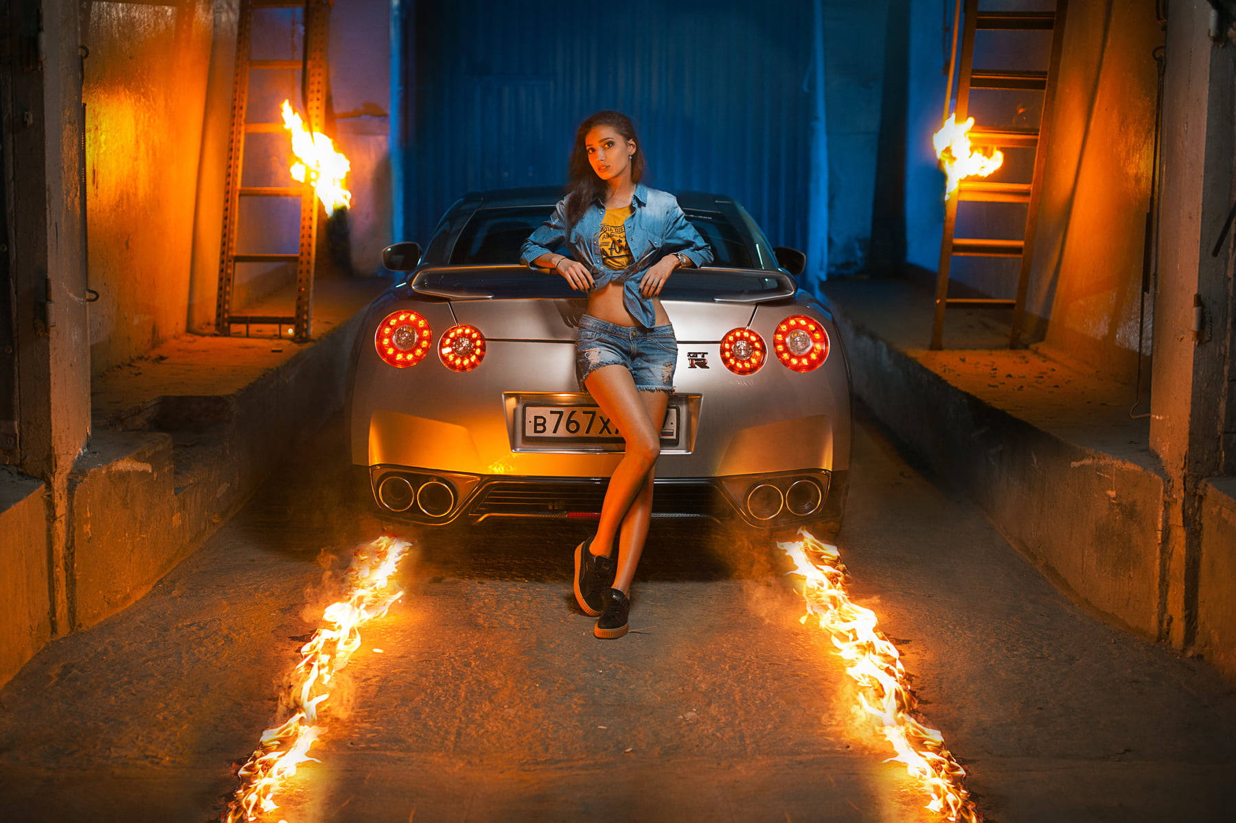 Fire Car In Garage With Woman Background