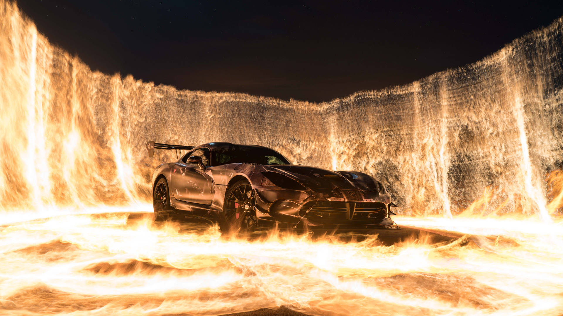 Fire Car In Wall Of Flames Background