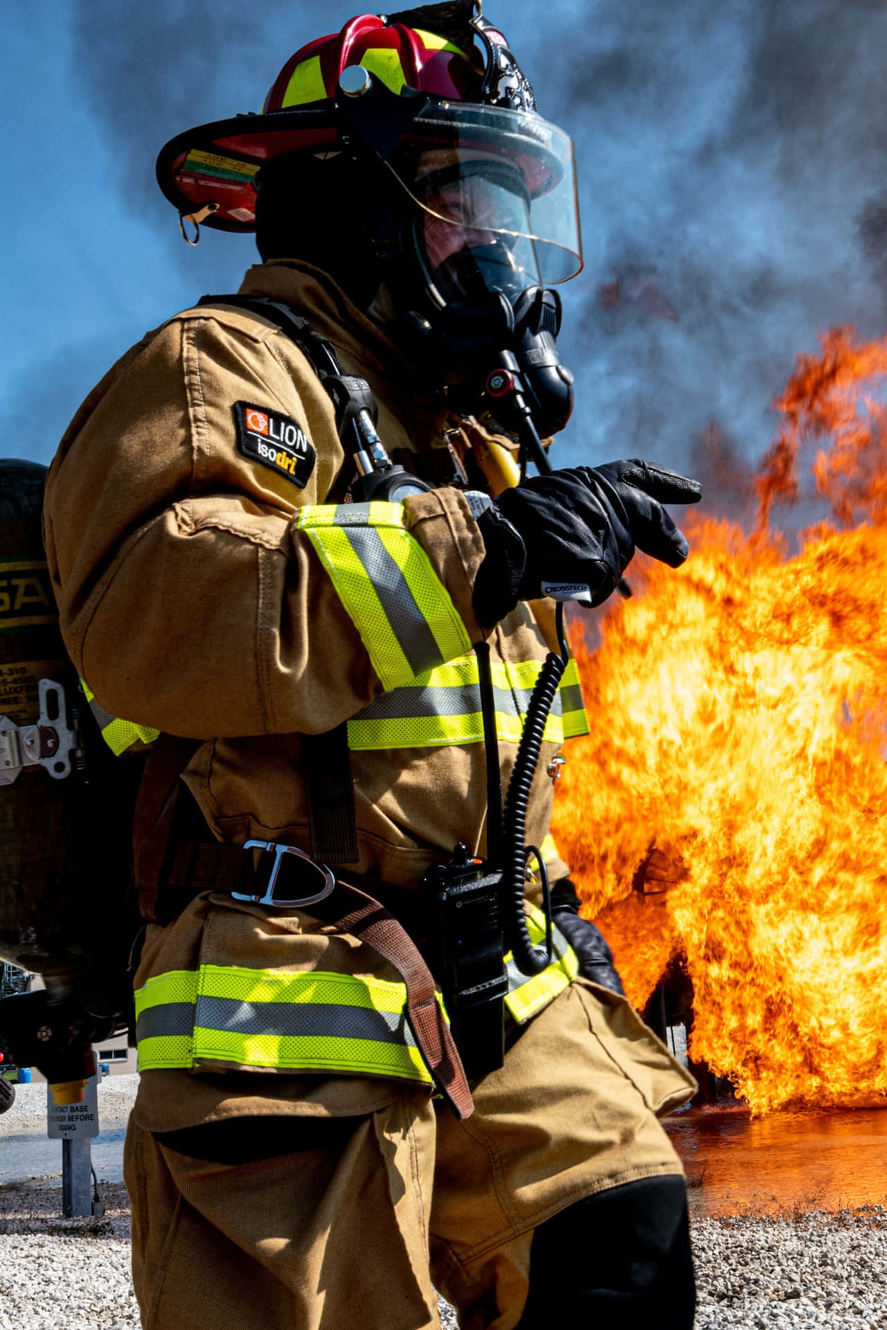 Fire Department Officer Wearing A Gas Mask Background