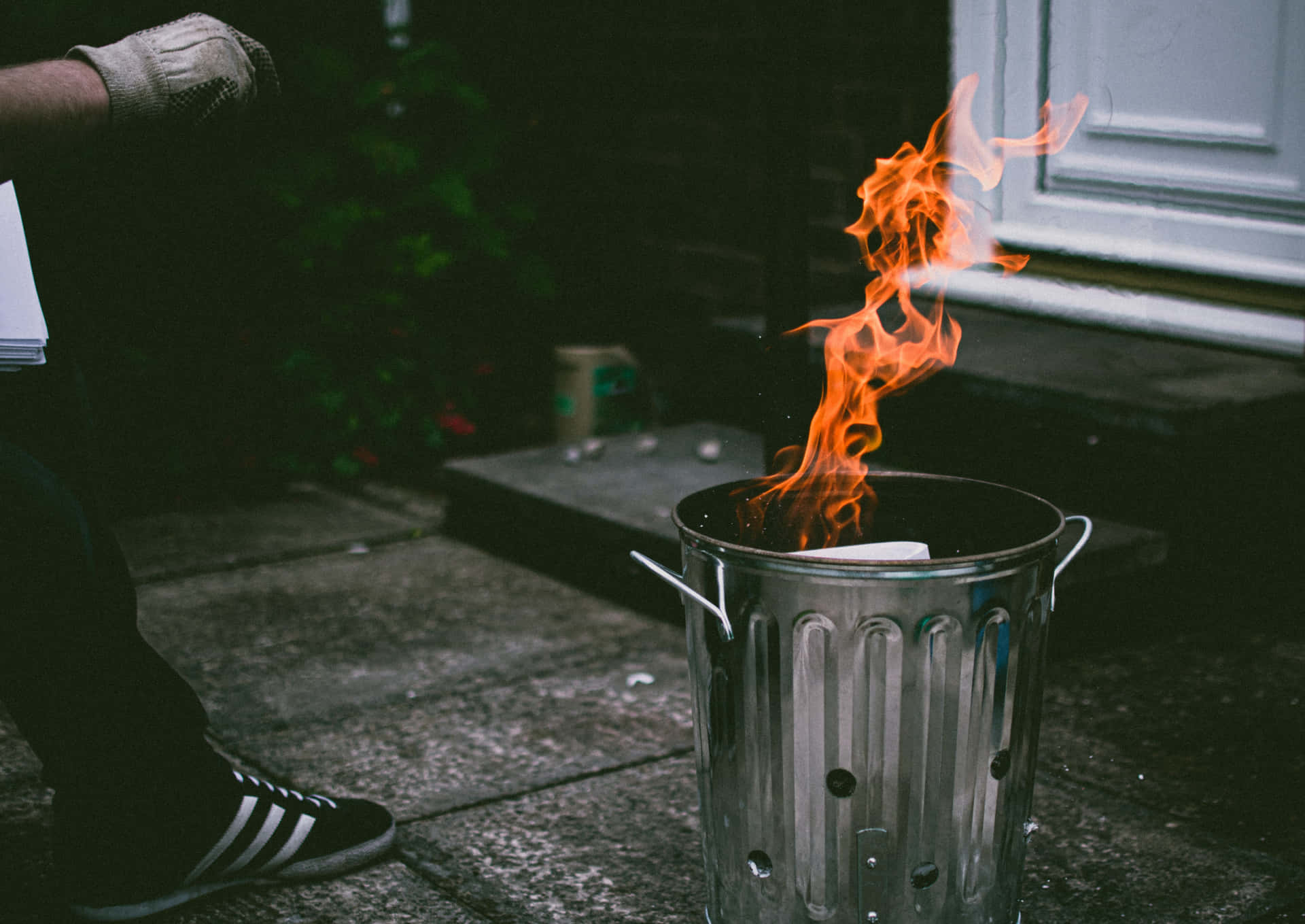 Fire Engulfs Stainless Steel Trash Can Background