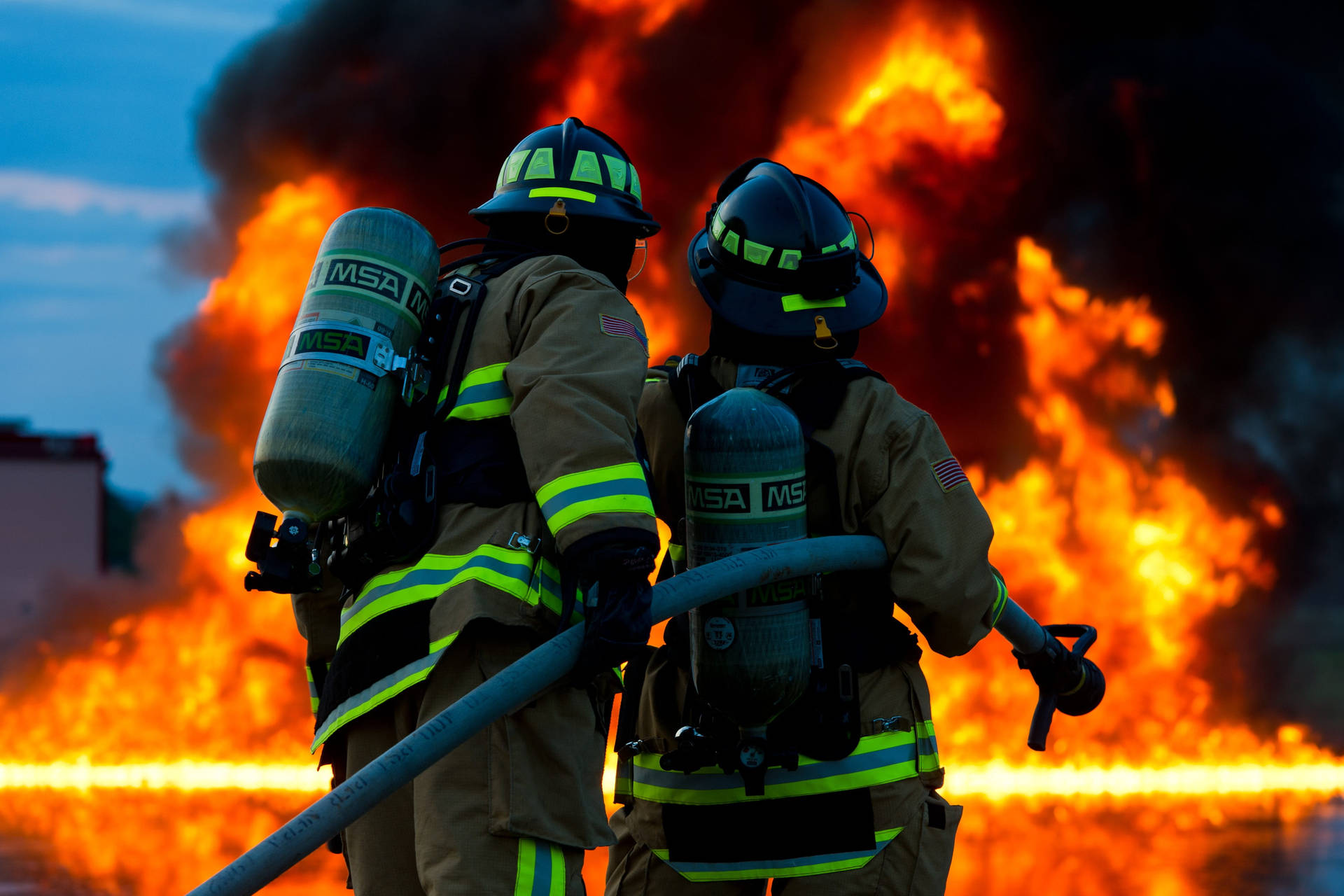 Firefighters Observing Large Fire