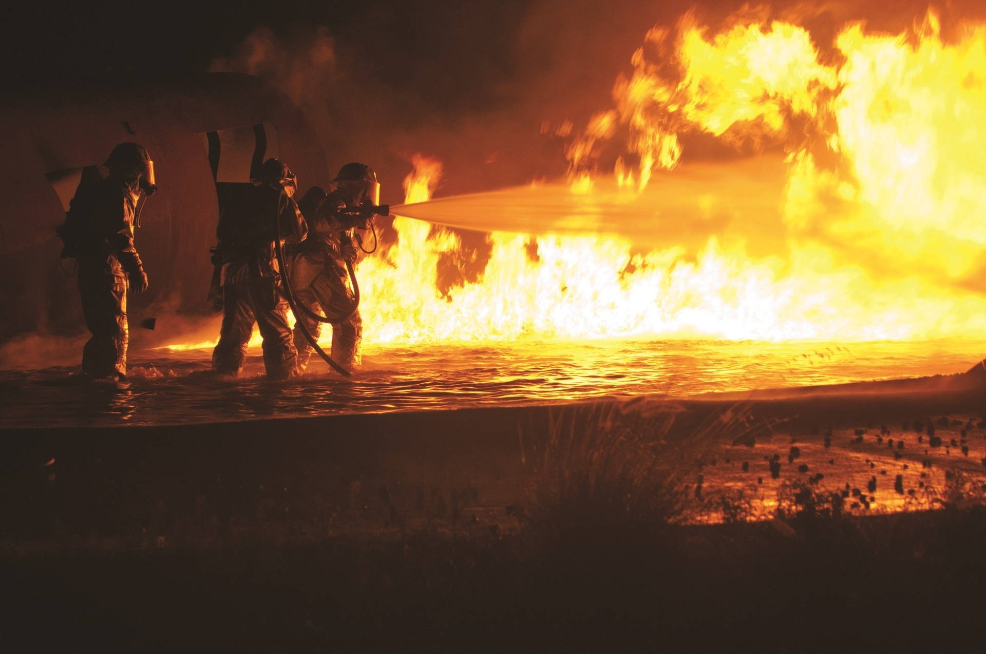 Fireman With The Huge Fire Background