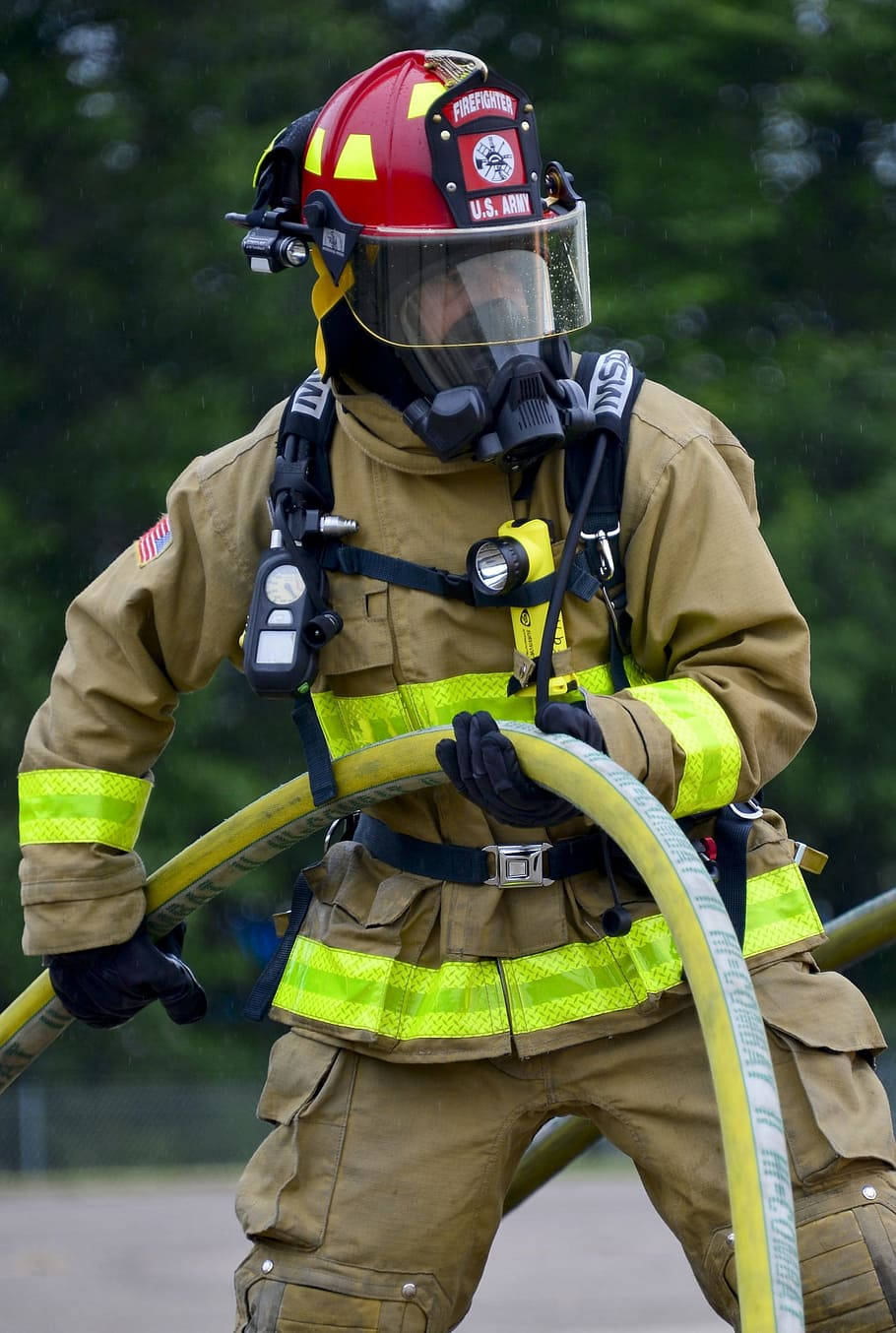 Fireman Working With A Fire Hose