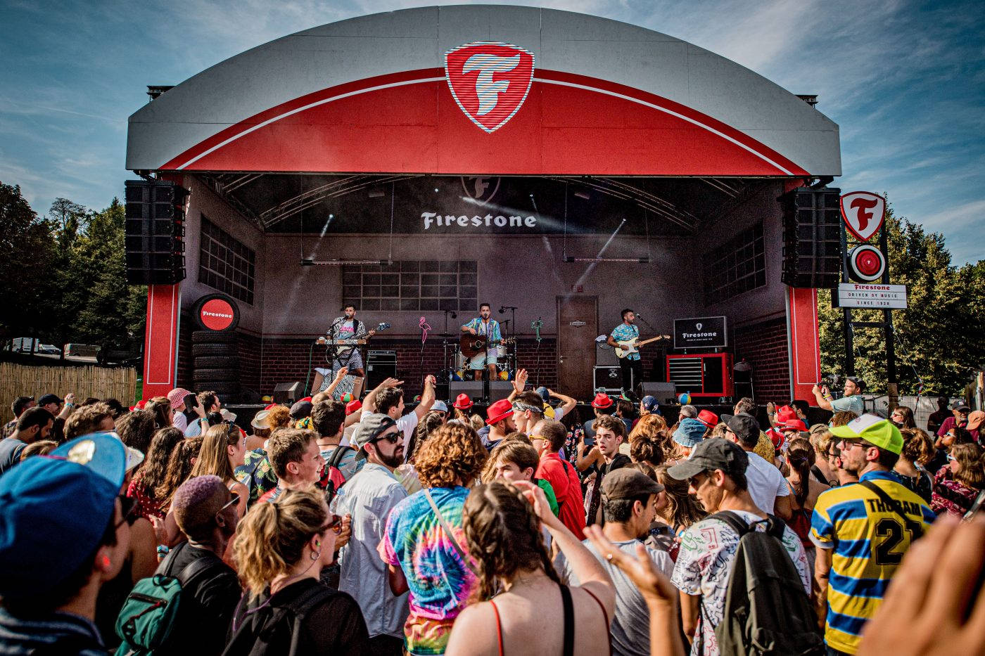 Firestone Logo On Concert Stage Background