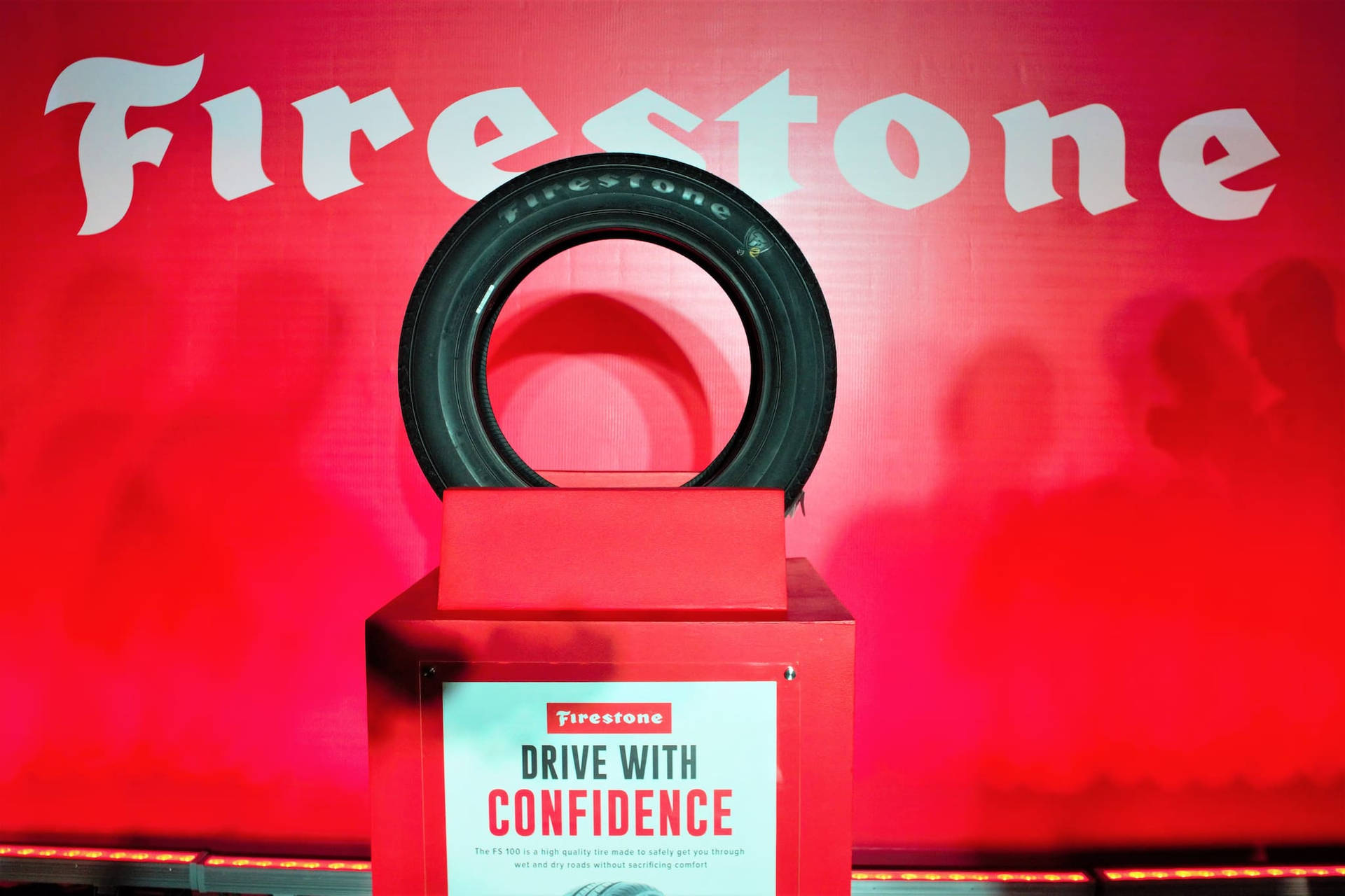 Firestone Tire With Red And White Background Background