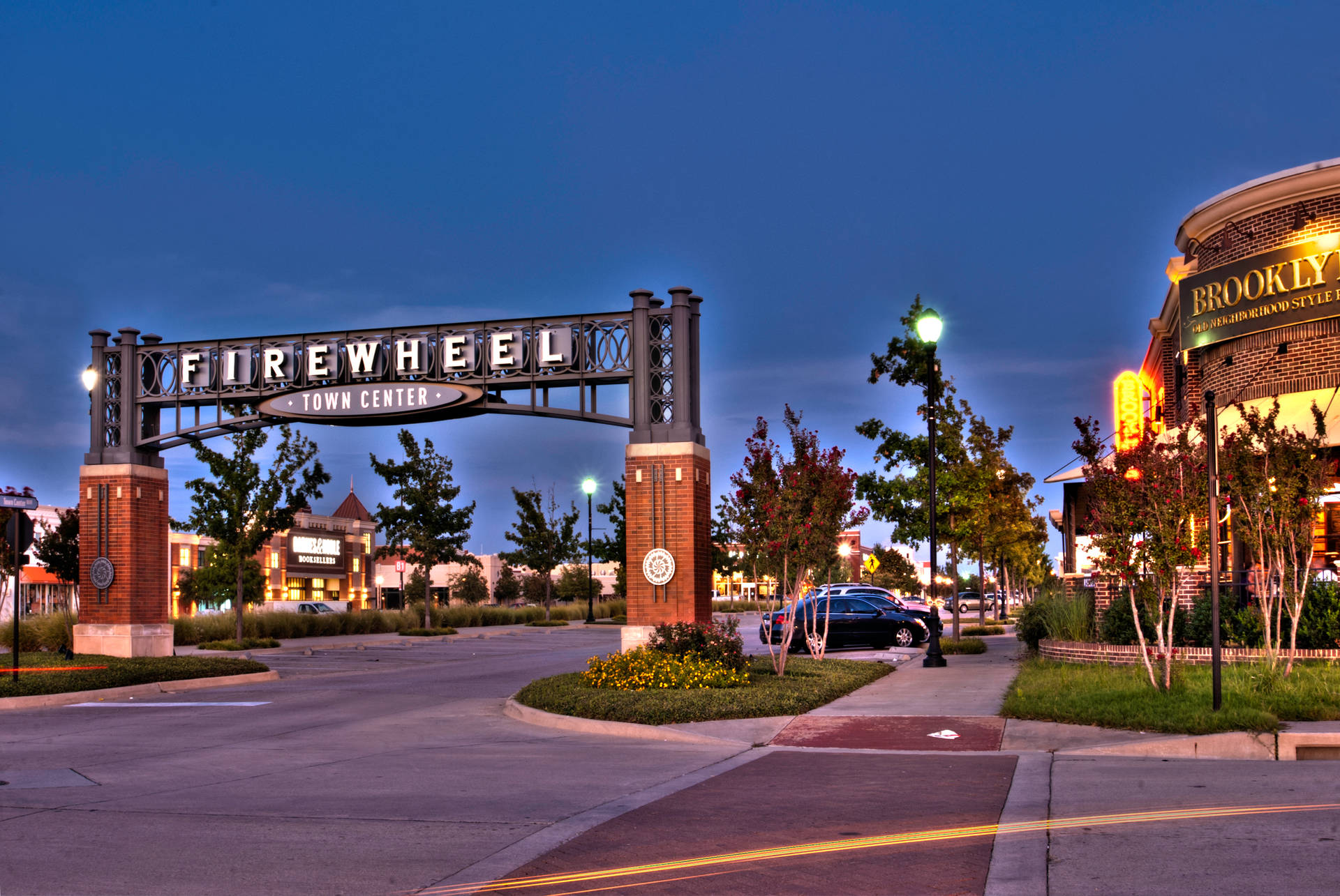 Firewheel Town Center Garland Welcome Arch Background