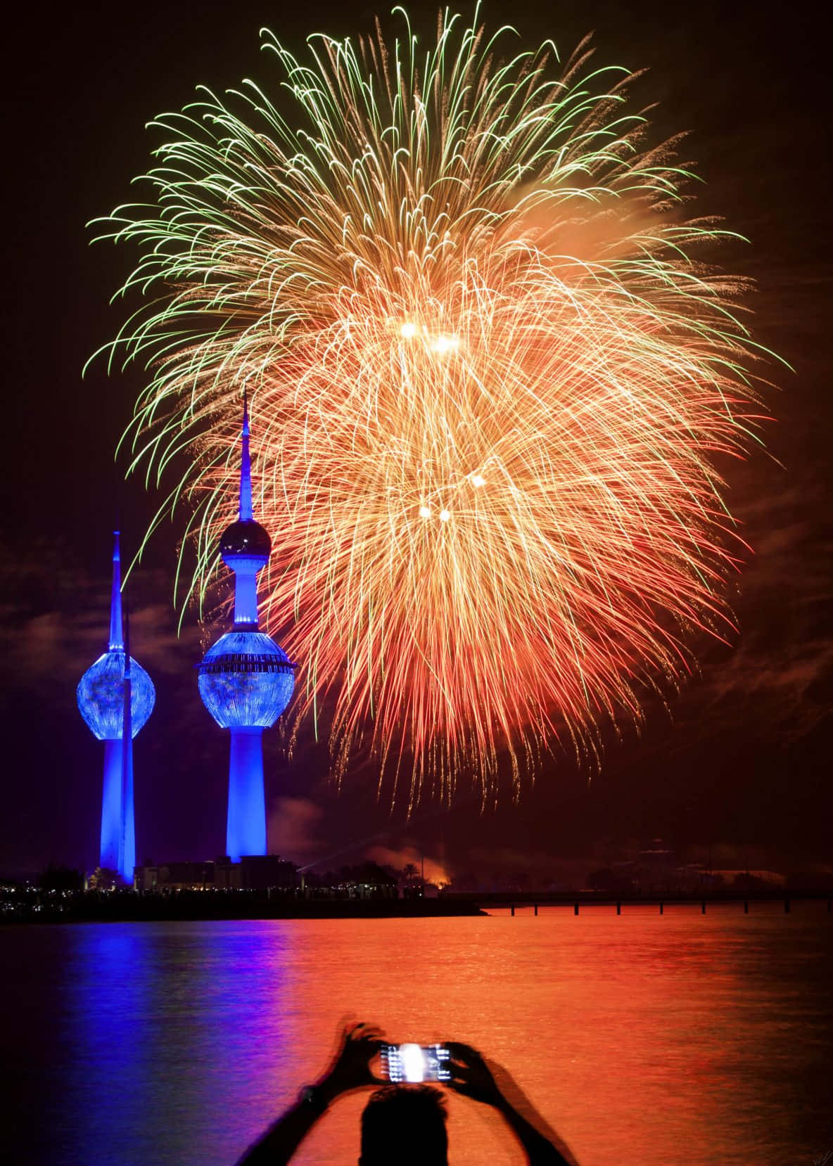 Fireworks Behind Kuwait Towers Phone Background