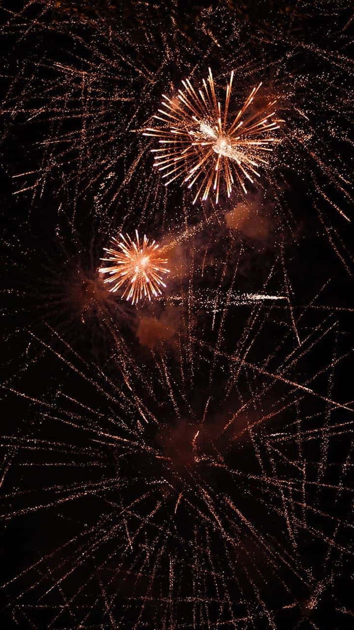 Fireworks In The Sky With A Black Background Background