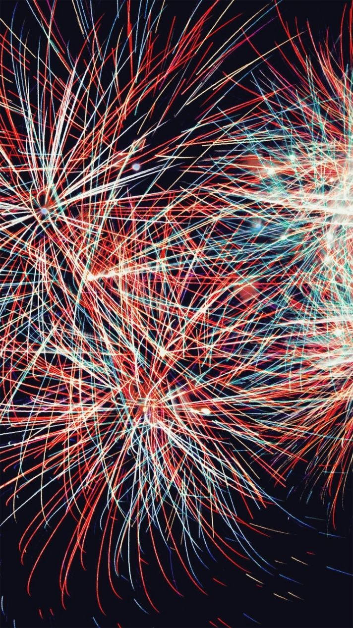 Fireworks In The Sky With Red, White And Blue Colors Background