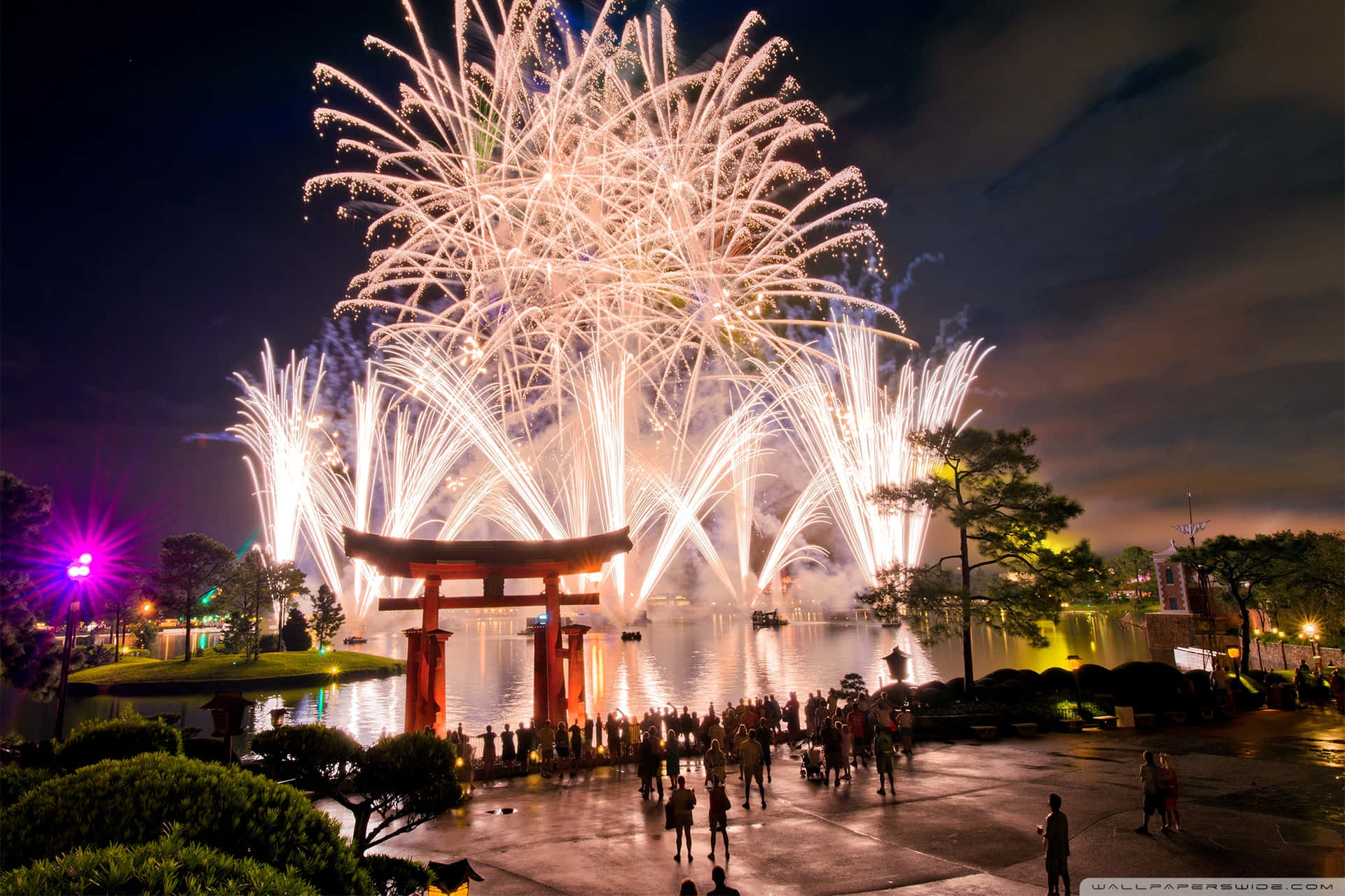 Fireworks Over A Torii Gate In The Night Sky Background