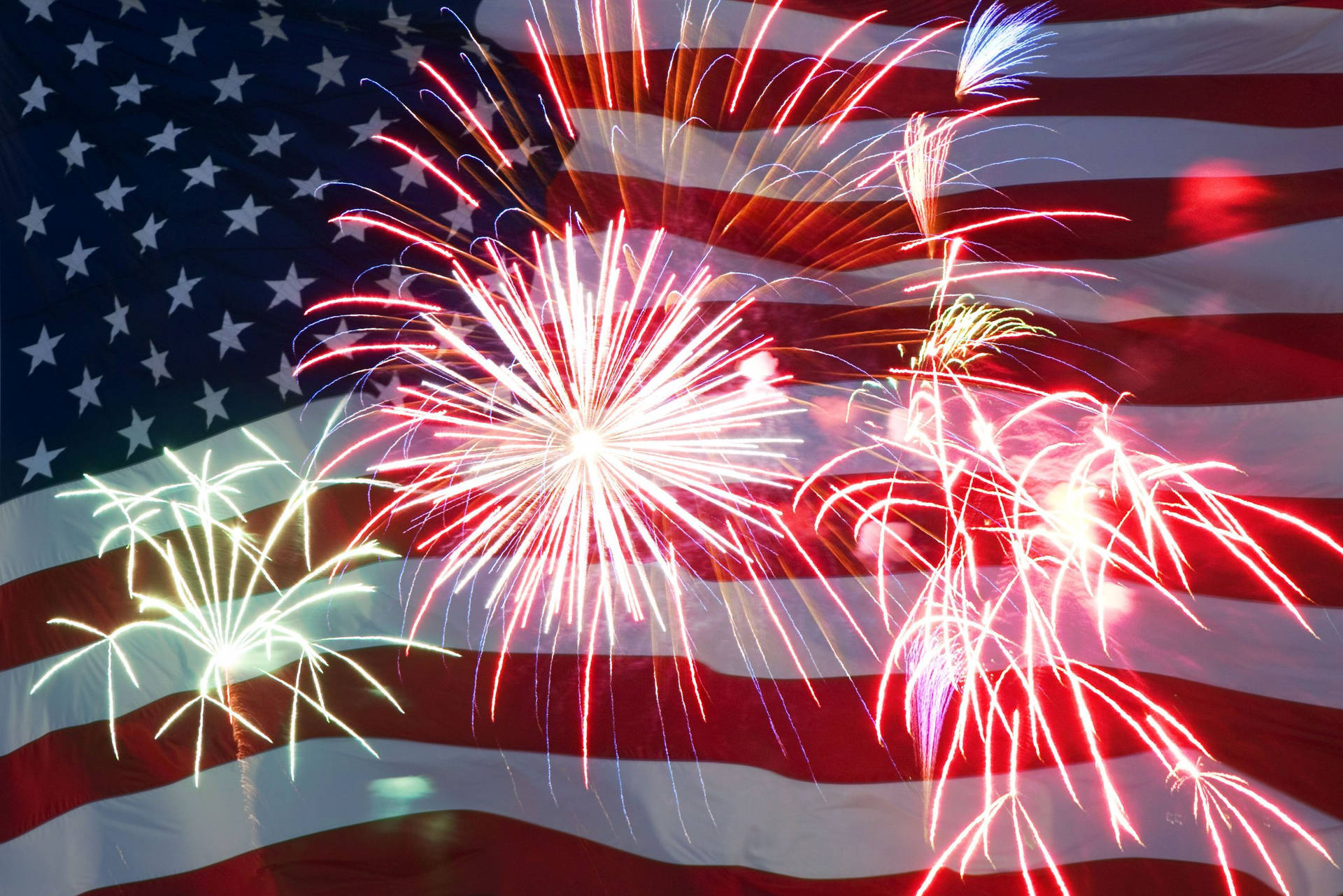 Fireworks Over The Us Flag Background