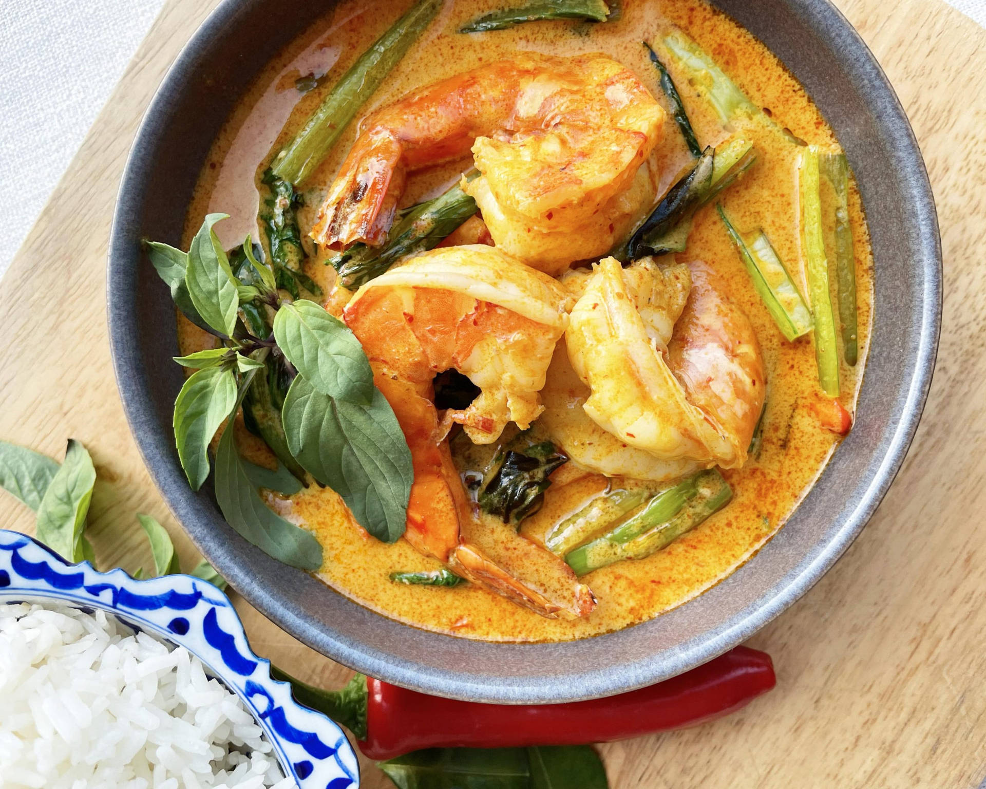 Fish Yellow Curry With Lime Basil Leaves Background