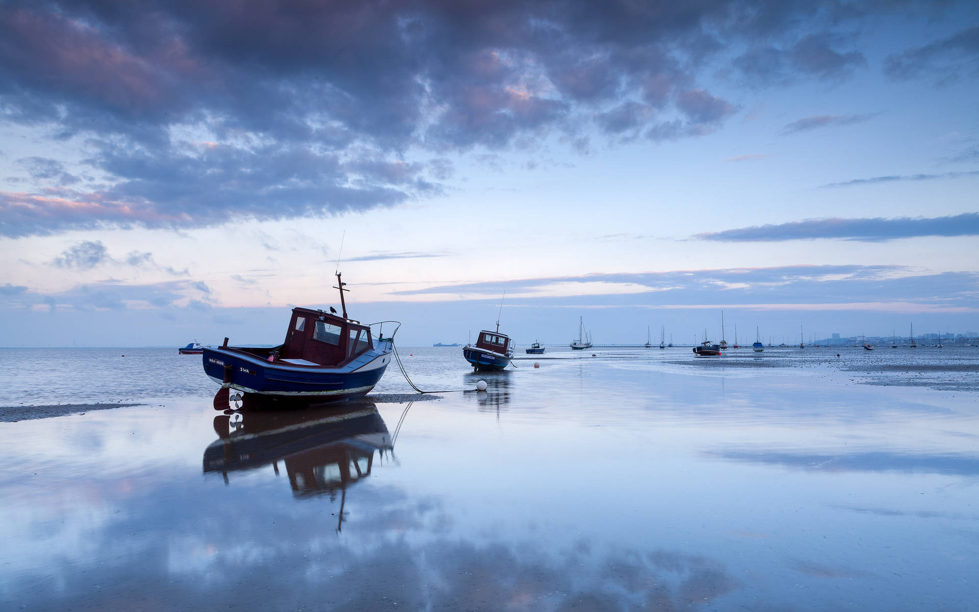 Fishing Boat At Low Tide