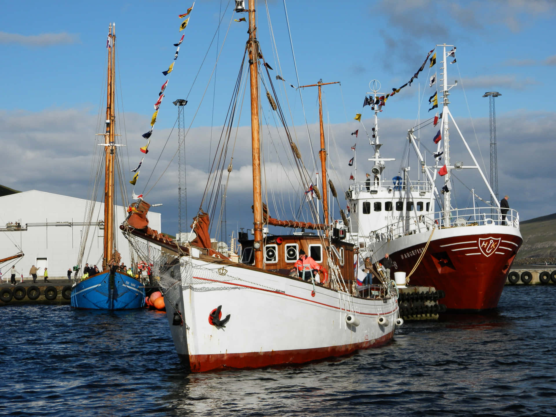 Fishing Boats In Thorshavn Background