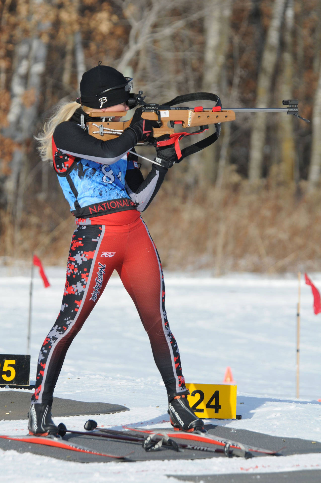 Fit Female Biathlon Athlete Rifle Shooting Segment