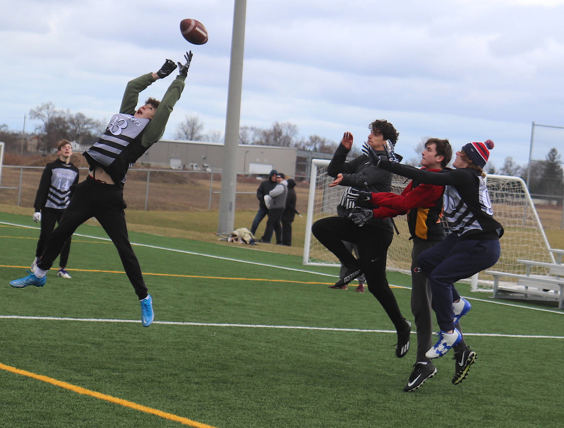 Flag Football Flying Ball On The Field Background