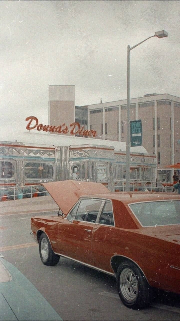Flashback Friday: Savor The Groove At Donna's Diner - A 70s Retro Aesthetic Background