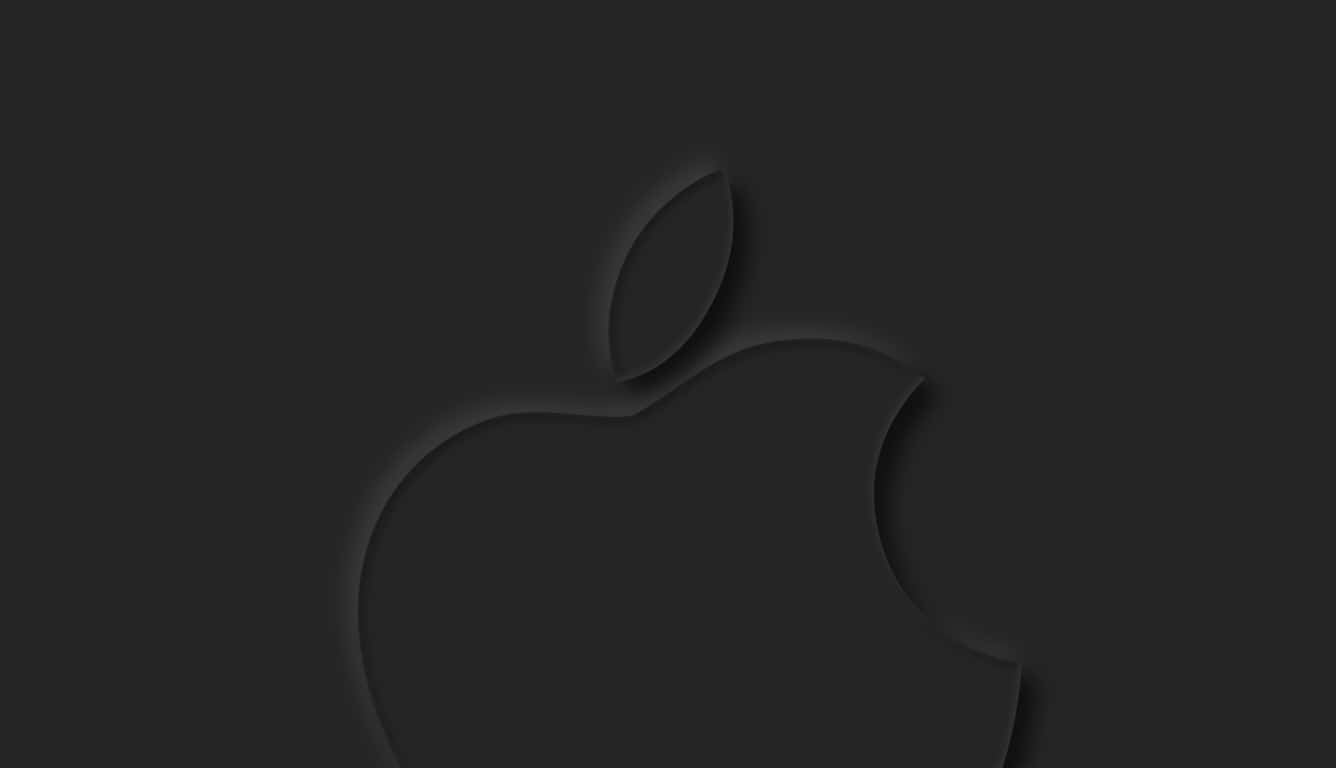 Flat Black Apple Logo In Black Background