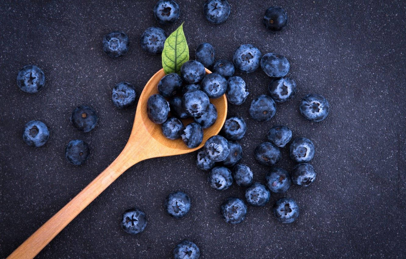 Flat Lay Of Blueberries On A Spoon