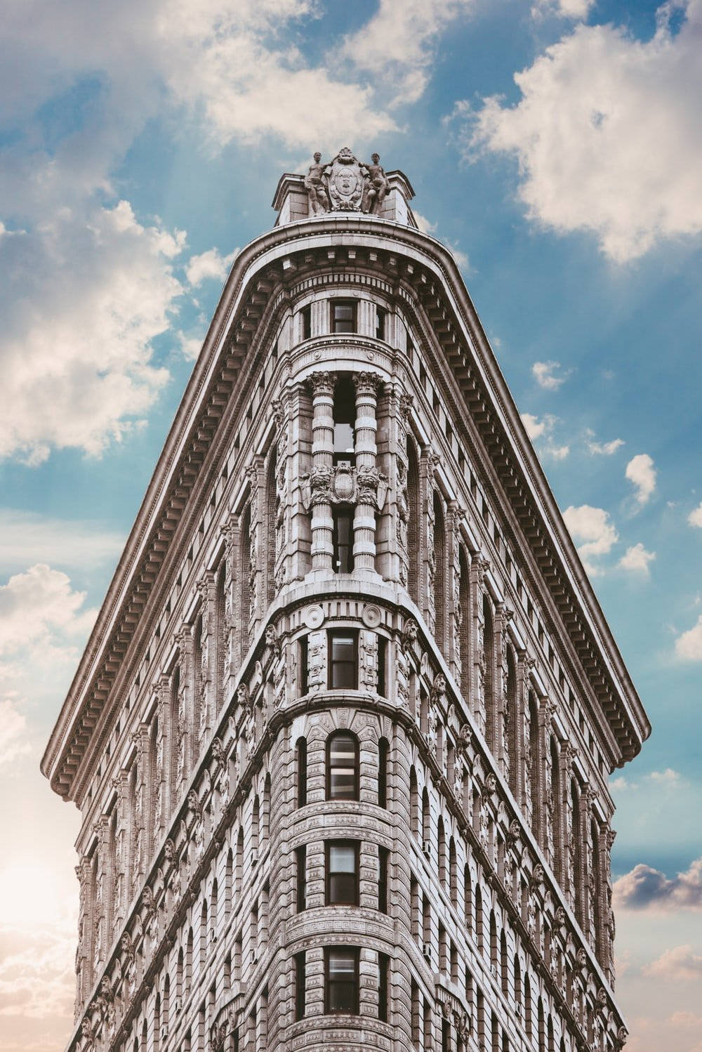 Flatiron Building Cloudy Blue Sky Background