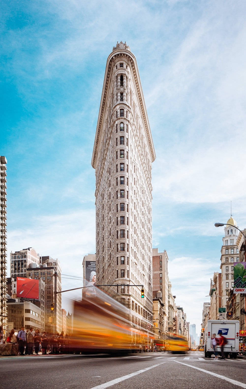 Flatiron Building Passing Bus Background