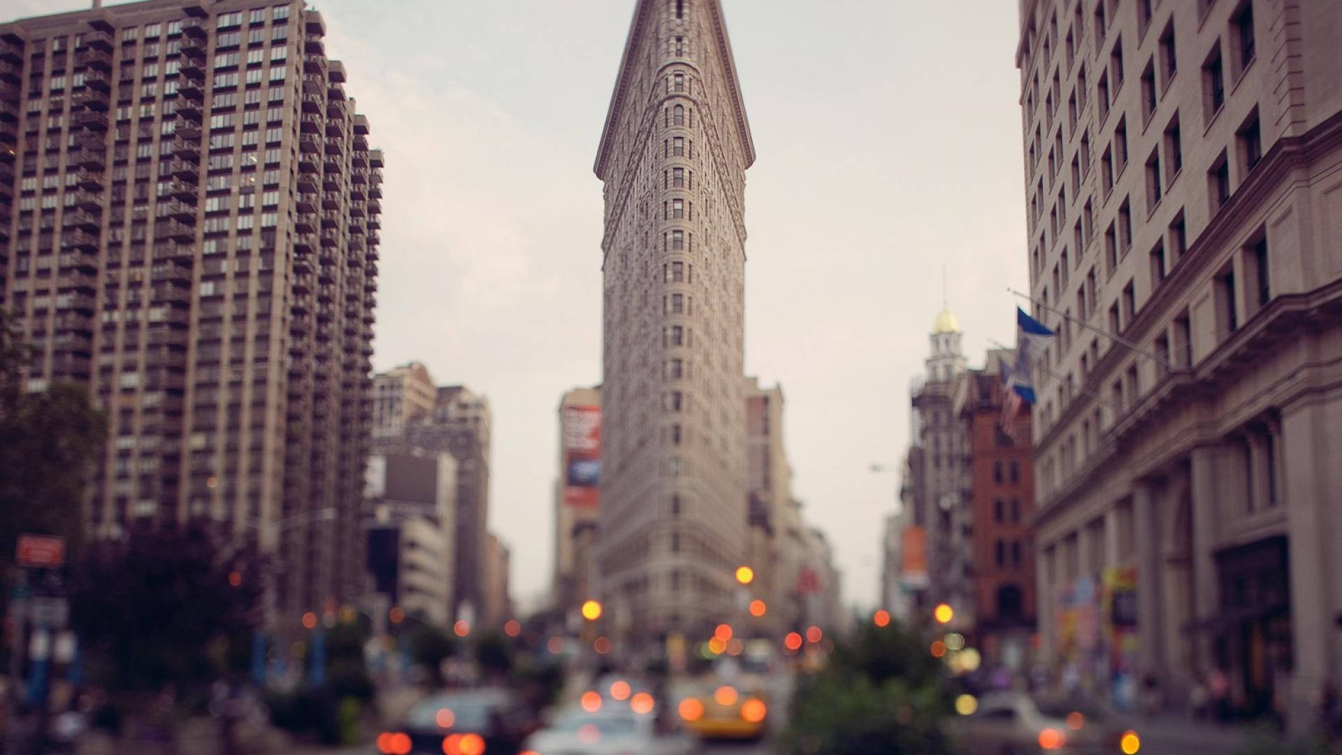 Flatiron Building Red Car Backlights Background