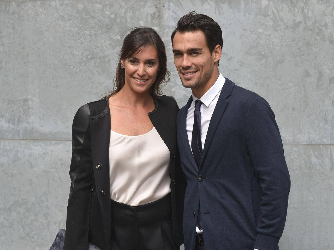 Flavia Pennetta And Her Husband Posing For A Picture Background