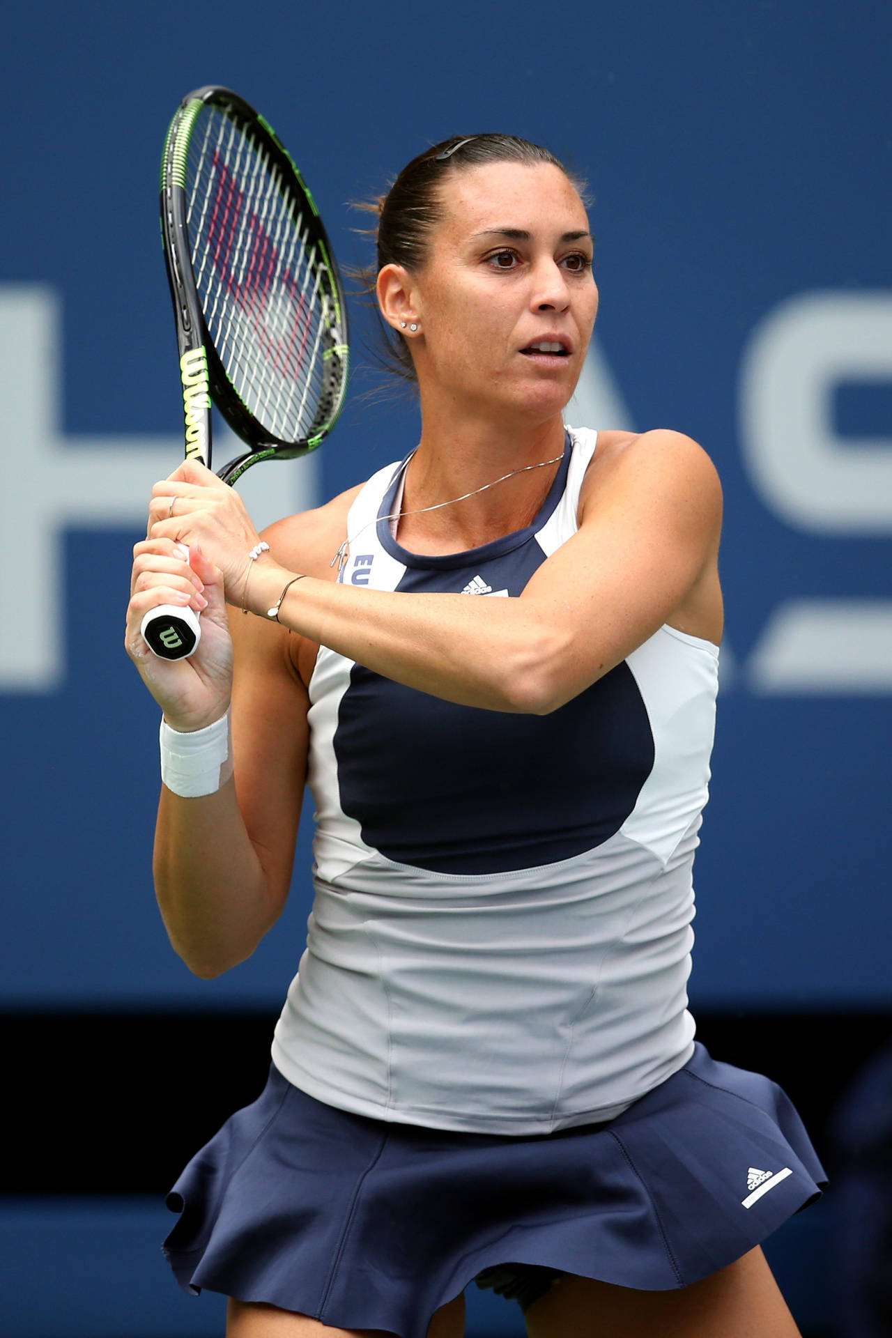 Flavia Pennetta Gripping Tennis Racket Background