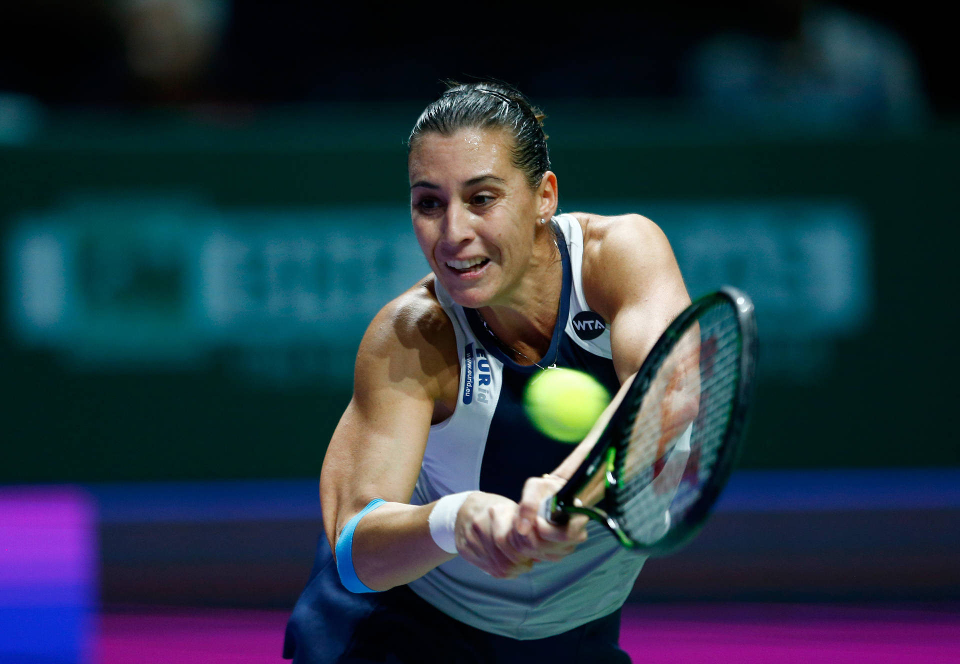 Flavia Pennetta Reaching For Ball Background