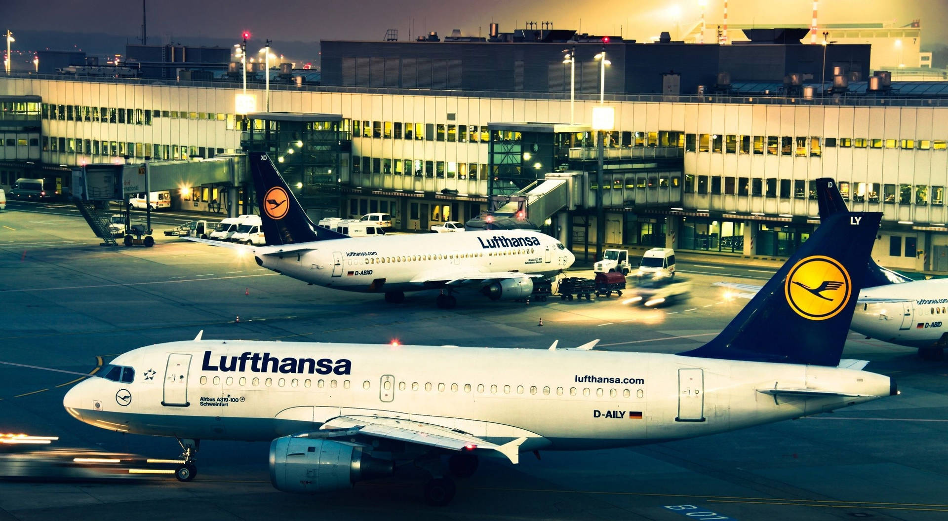 Fleet Of Deutsche Lufthansa Airplanes Background