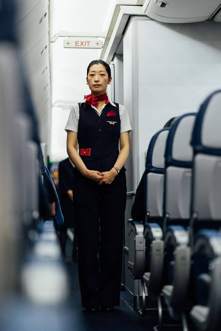 Flight Attendant In Uniform Background