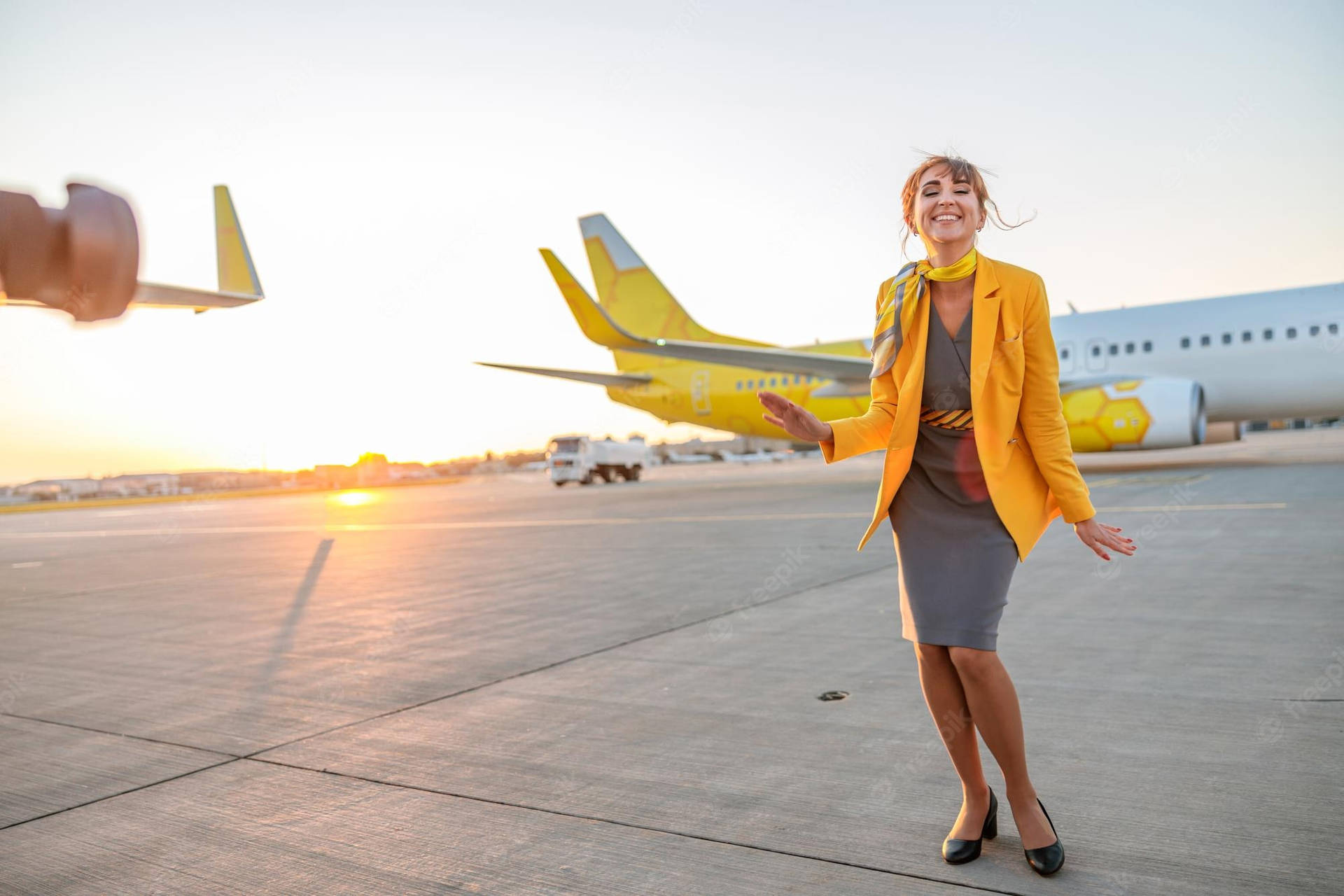 Flight Attendant In Yellow