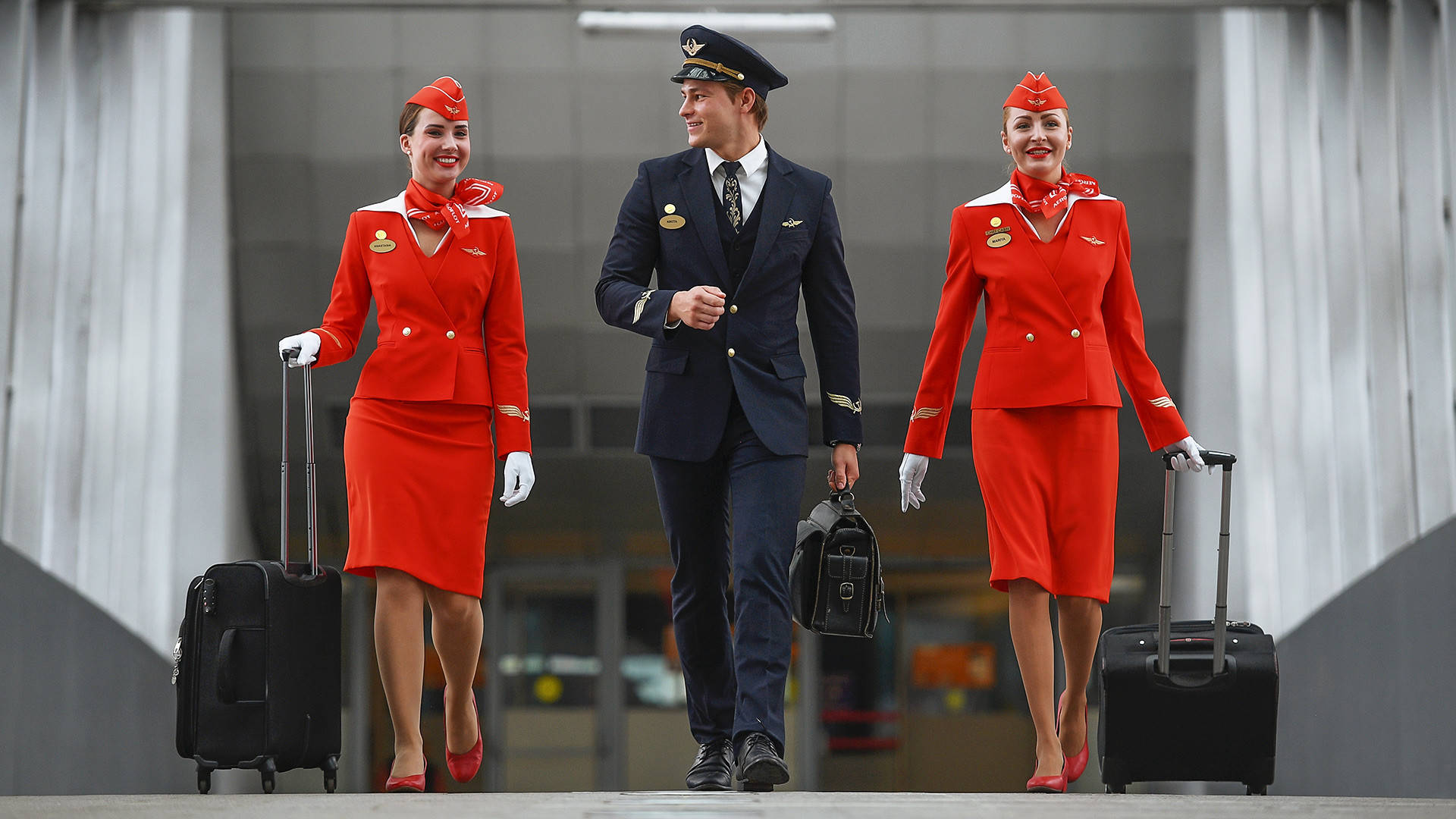 Flight Attendants With Pilot