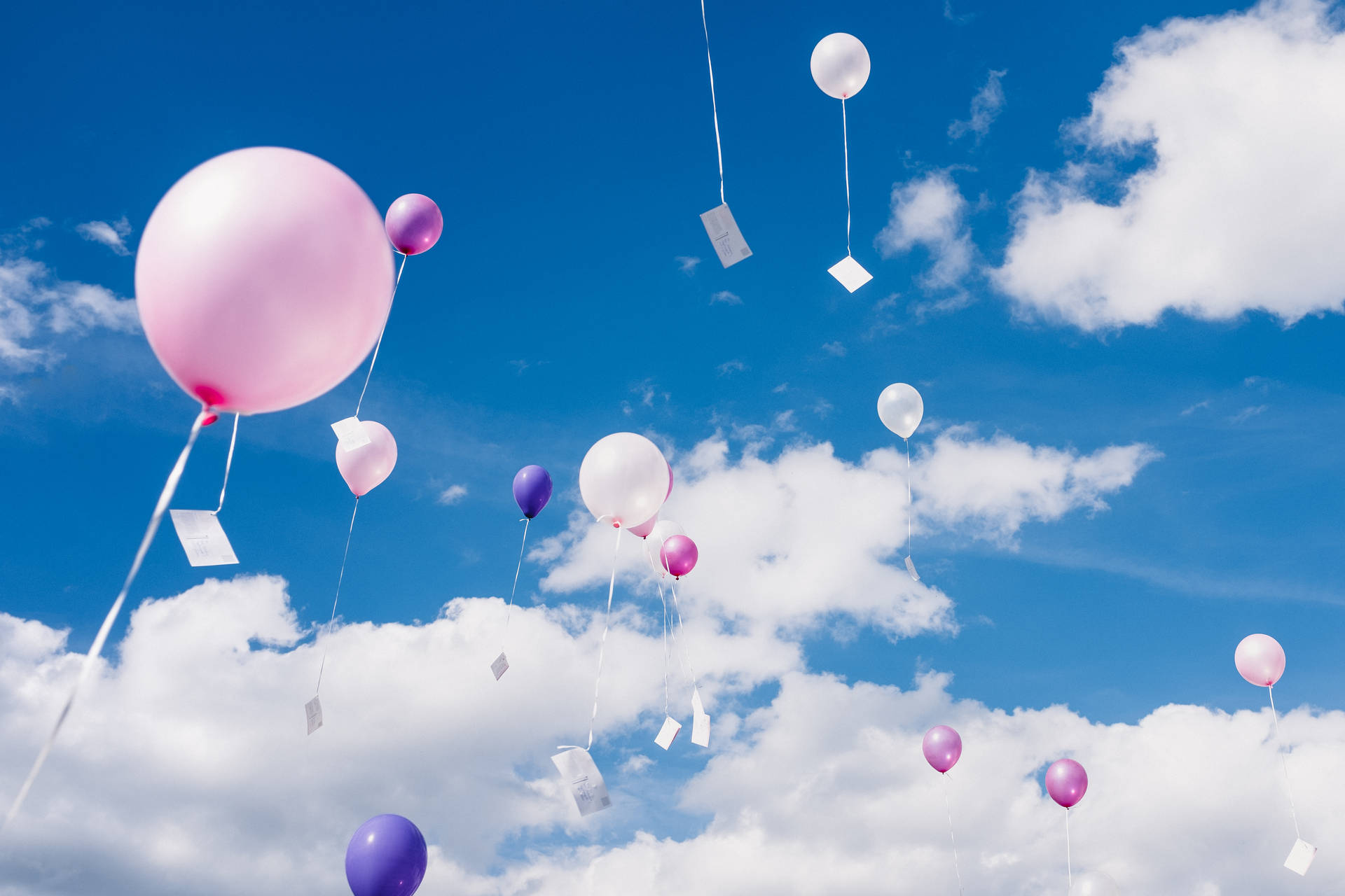 Floating Balloons In Sky Background