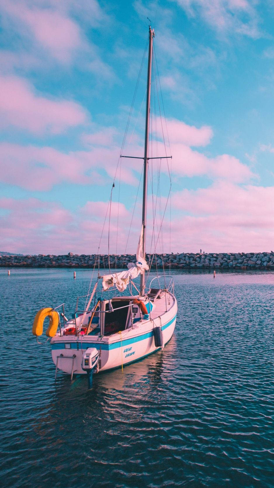 Floating Pink Boat With Pink Clouds Above Background