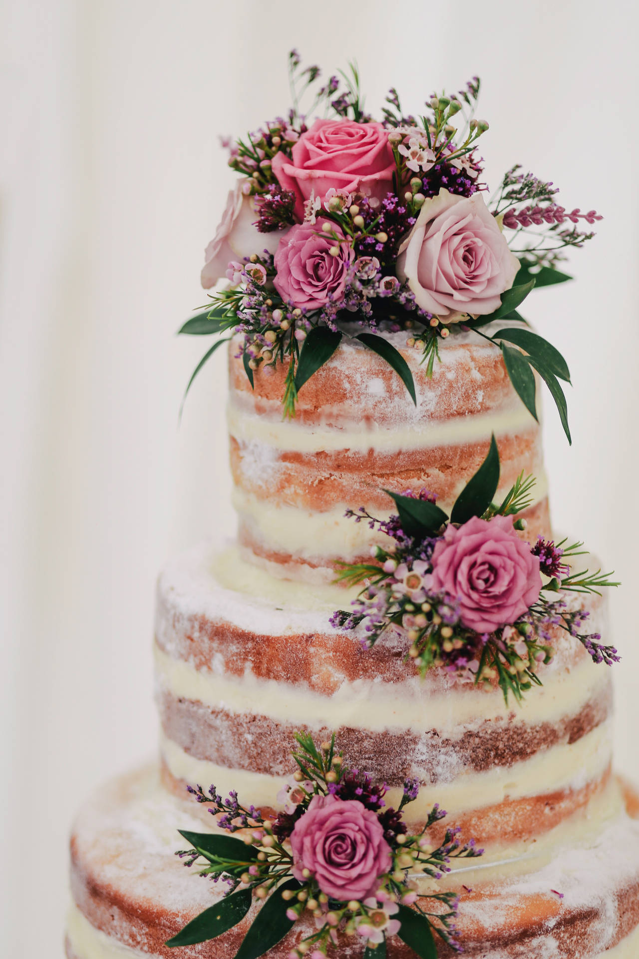 Floral Multi Layered Naked Wedding Cake Background