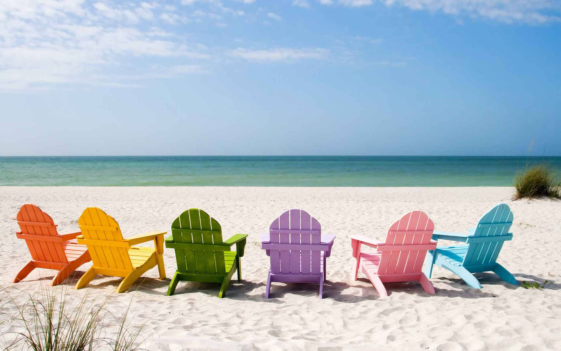 Florida Beach And Colorful Sunchairs Background