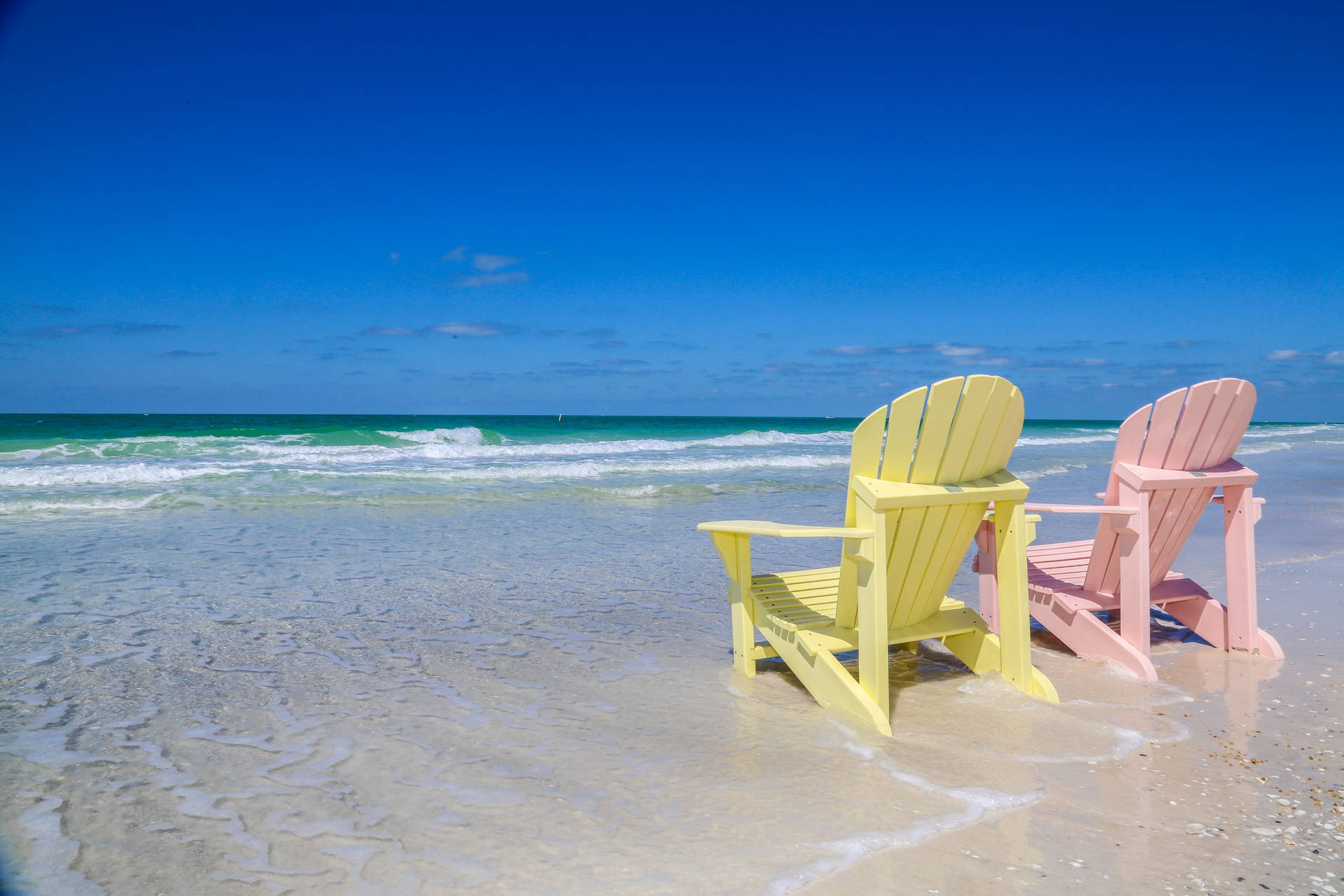 Florida Beach Pink And Yellow Sunchairs Background