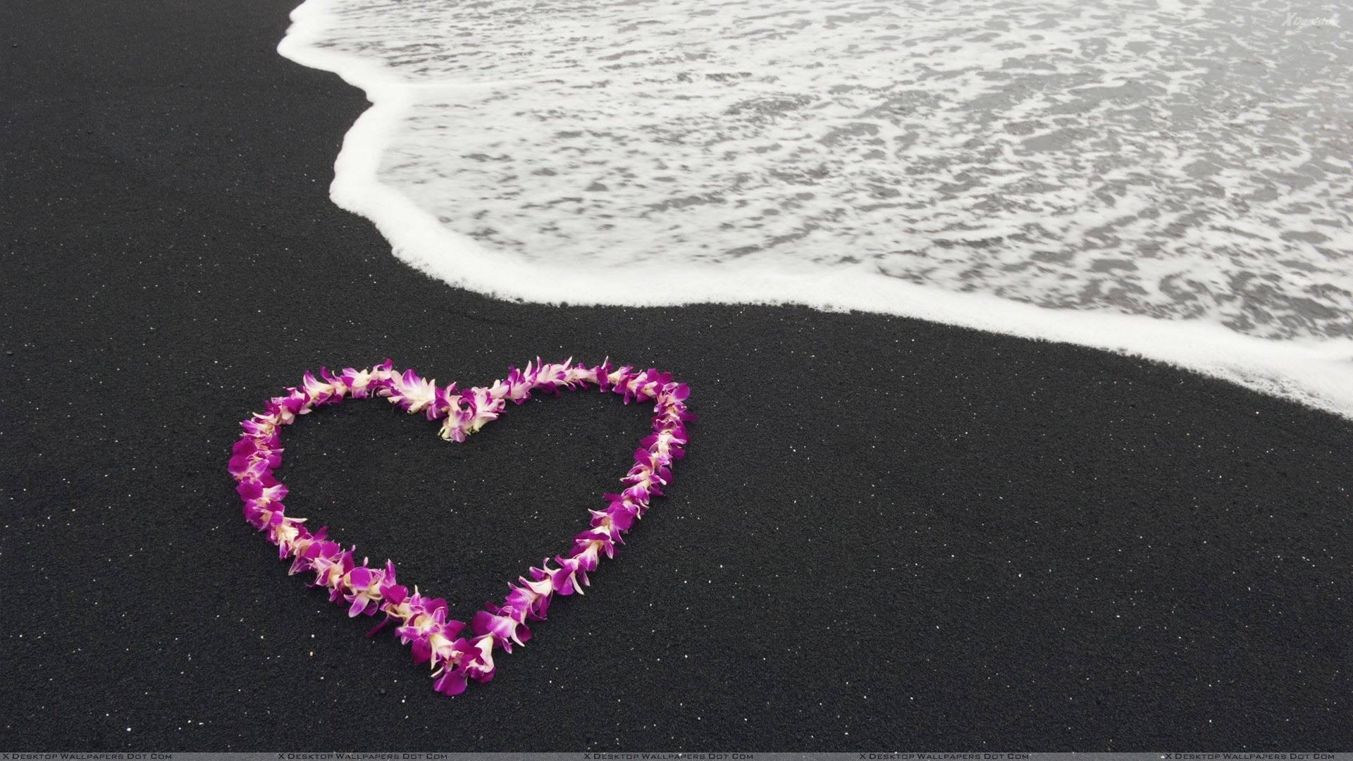 Flower Heart On The Beach Background