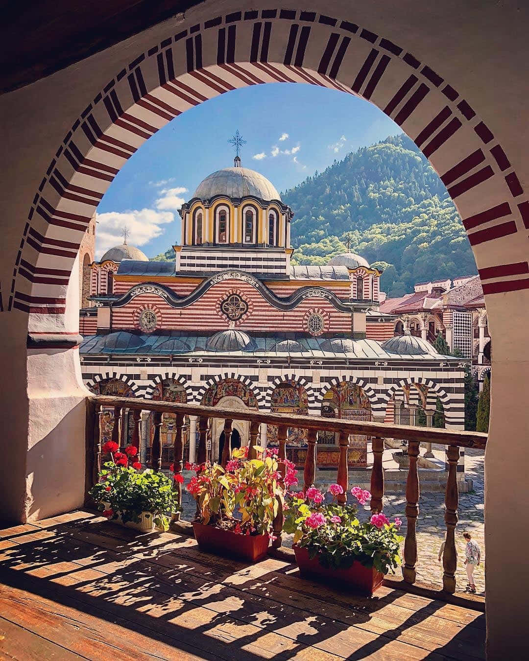 Flowers On Balcony In Rila Monastery Background