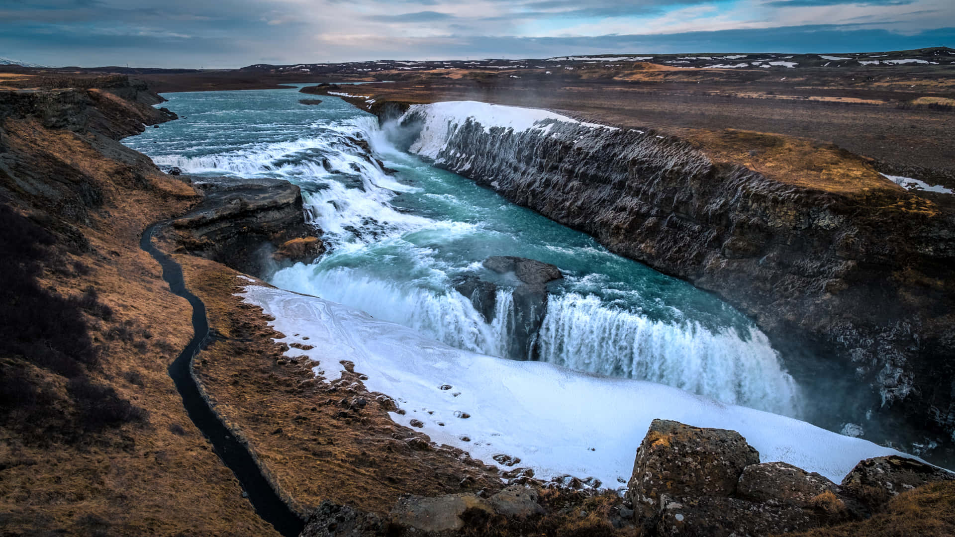 Flowing Gullfoss Waterfall In Southwest Iceland Background