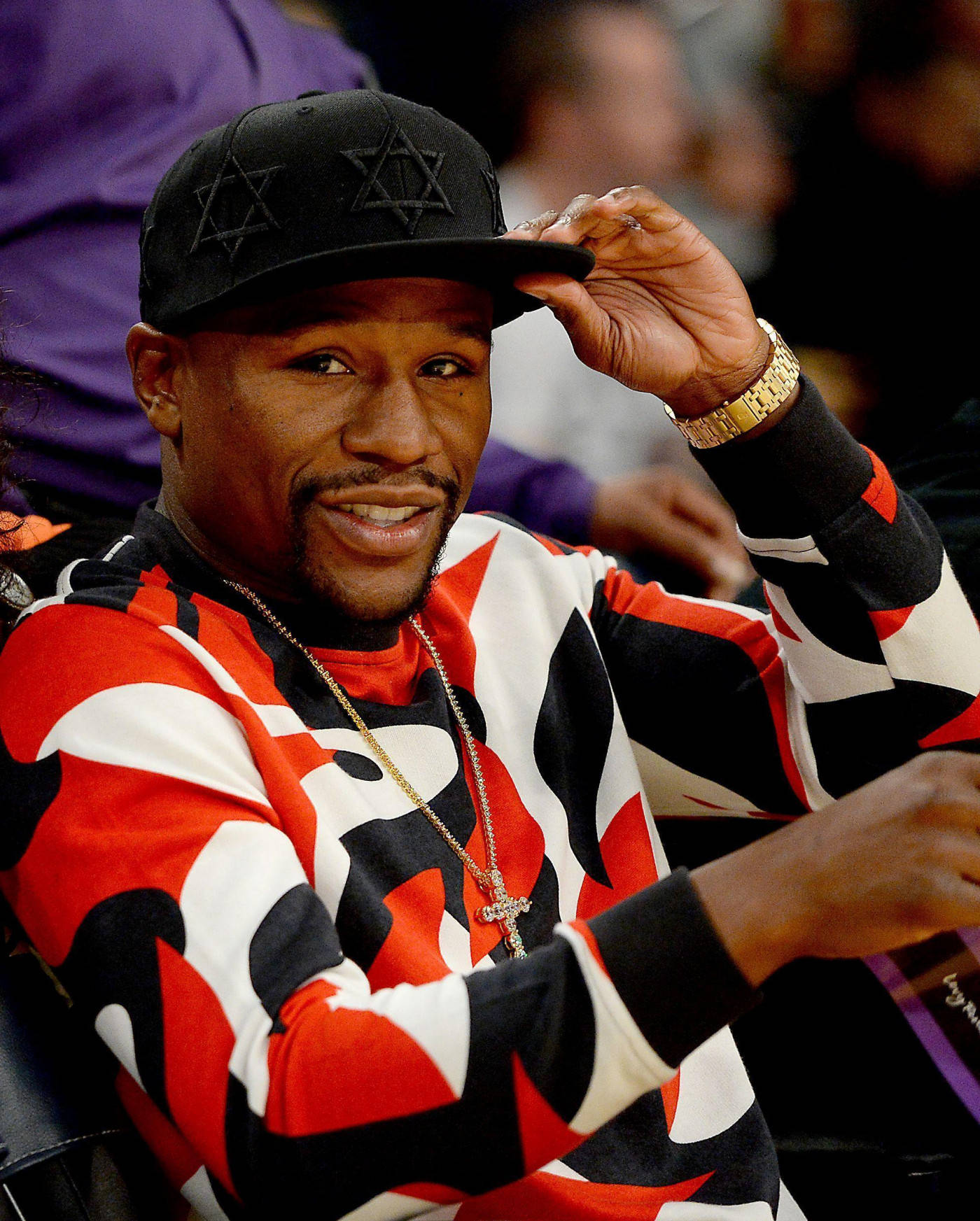 Floyd Mayweather Holding His Cap Background