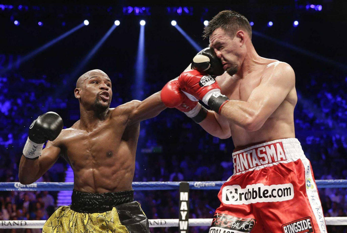 Floyd Mayweather Quickly Jabbing His Opponent Background