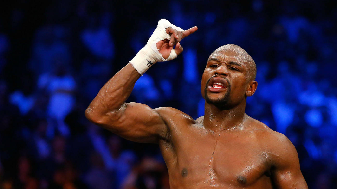 Floyd Mayweather Raising A Finger Background