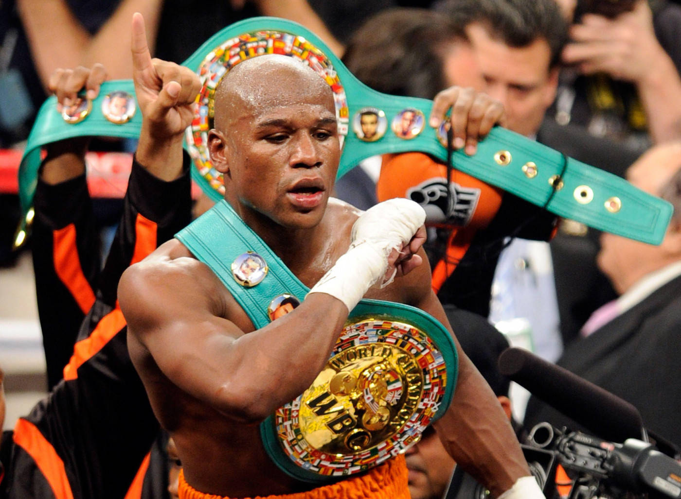 Floyd Mayweather Showing Off His Belt Background