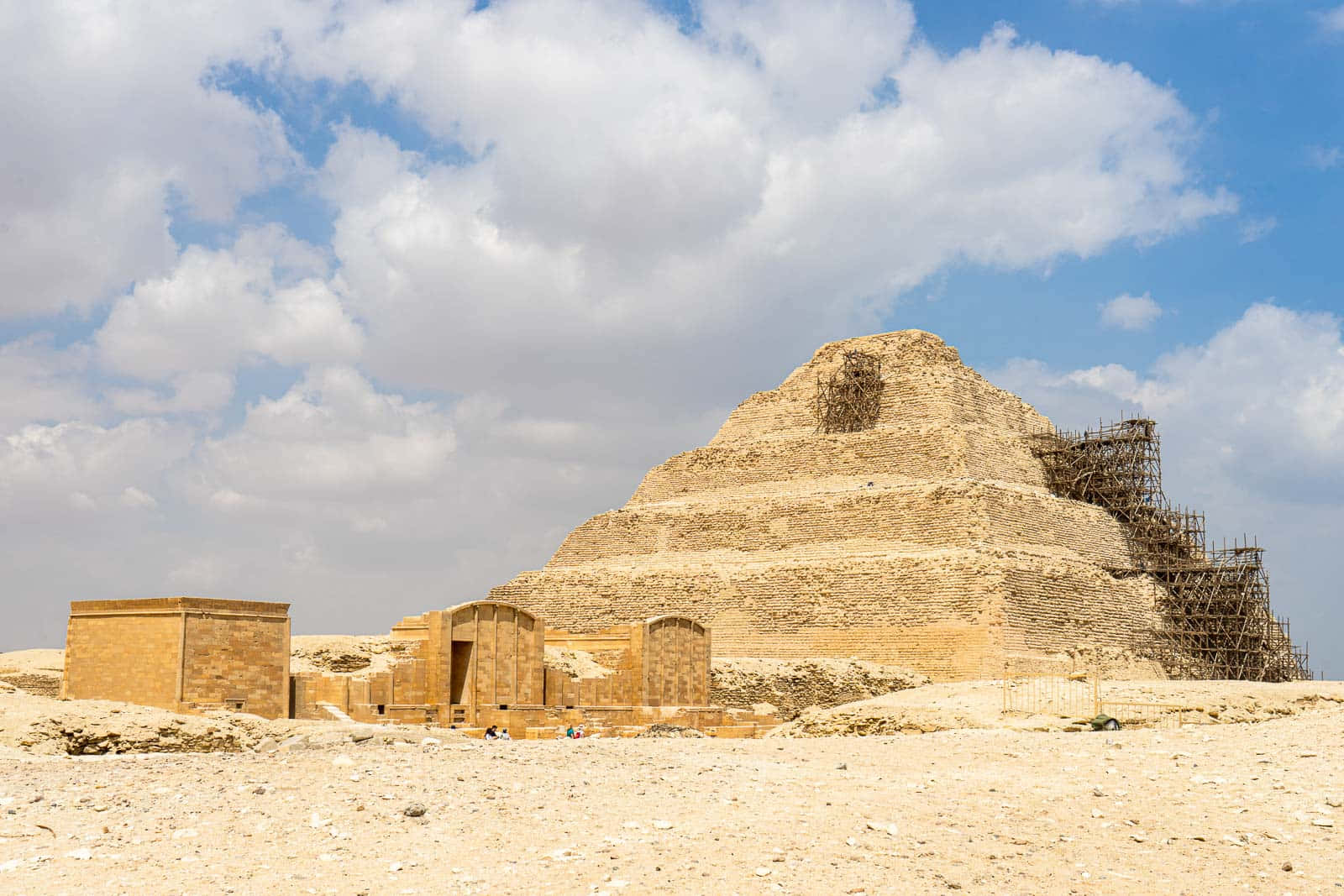 Fluffy Clouds Above Saqqara Pyramid Background