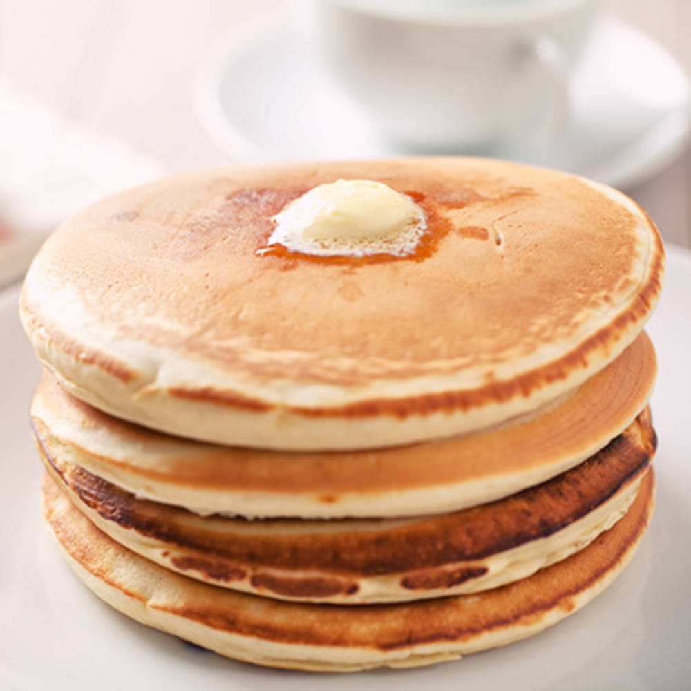 Fluffy Pancakes With Buttermilk Background