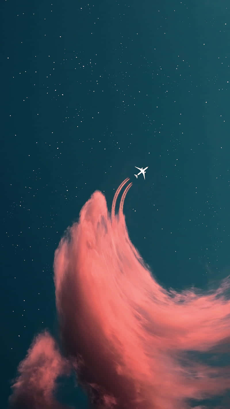 Fly Above The Clouds With The Amazing Pink Plane Background