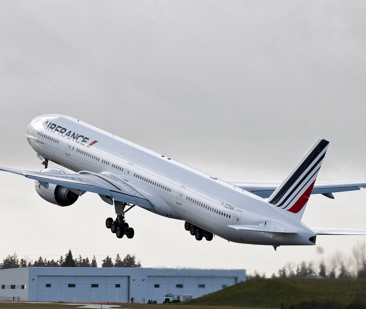 Flying Air France Airline Plane Below Clear Sky Background