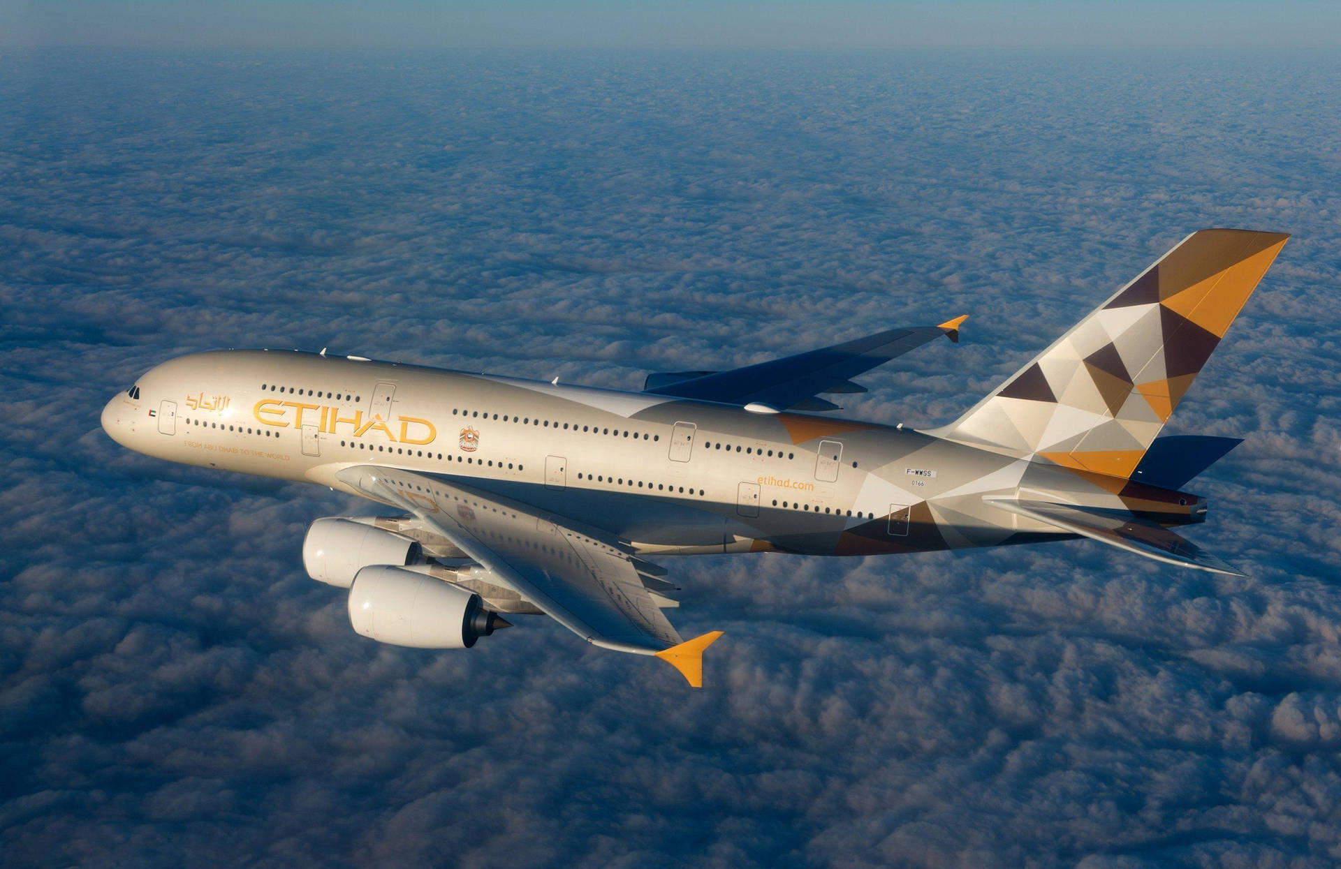 Flying Etihad Airplane Over The Clouds Background